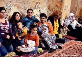 Surviving Syrian refugee family members hold close to one another. <br/>Christian Aid Mission
