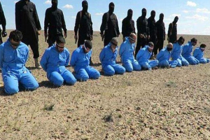 In a video which is thought to have surfaced earlier this year, ten men in blue jumpsuits were shot dead after they were accused of being spies. <br/>Reuters