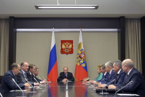 Russian President Vladimir Putin (C) chairs a meeting with members of the Security Council at the Novo-Ogaryovo state residence outside Moscow, Russia, September 29, 2015.  <br/>REUTERS/Alexei Druzhinin/RIA Novosti/Kremlin