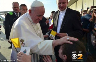 Julia Bruzzese (right) went to JFK Airport to see Pope Francis last month and received his blessing. <br/>CBS News