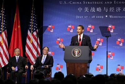 President Barack Obama welcomes China's Vice Premier Wang Qishan, center, and State Councilor Dai Bingguo, left, as he opens the U.S.-China Strategic and Economic Dialogue in Washington, Monday, July 27, 2009. The meetings are expected to expose sharp differences on trade and soaring U.S. budget deficits. <br/>(Photo: AP Images / J. Scott Applewhite)