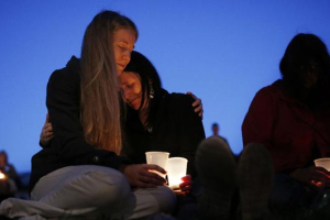 Thousands gather for vigil remembering Oregon college shooting victims <br/>Getty Images