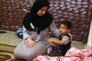 This young Syrian mother and her two children have become refugees. <br/>Intercede News Service