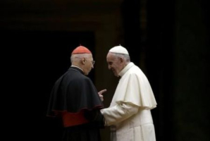 Pope Francis is greeted by Cardinal Angelo Bagnasco (L) as he leaves at the end of the opening mass for the synod of bishops on the family at St. Peter's Basilica in the Vatican October 3, 2015. <br/> REUTERS/Max Rossi