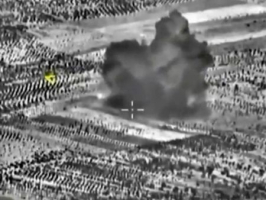 A frame grab taken from footage released by Russia's Defence Ministry October 3, 2015, shows smoke rising after airstrikes carried out by Russian air force on what Russia says was a bomb factory in Maarat al-Numan, south of the town of Idlib, Syria. <br/> REUTERS/Ministry of Defence of the Russian Federation/Handout via Reuters