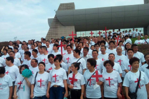 A growing number of Christians around the globe are displaying red crosses in solidarity with the Chinese church. <br/>AP photo
