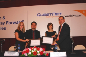 (Left to right) Ms. Yolanda Reimer, Asia Corporate Development Officer, World Vision;  Mr. Boris Joaquin, Publics in Ministry Director, World Vision Philippines, Ms. Donna Imson, Executive Chairperson, QuestNet Ltd. and Trustee of the RYTHM Foundation, and Mr. JR Mayer, Managing Director, QuestNet Ltd. signed the partnership Memorandum for the “QuestNet Pays Forwards” Programme. <br/>