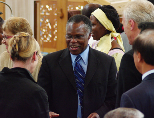 The Rev. Dr. Samuel Kobia, outgoing general secretary of the World Council of Churches, greets well-wishers at his farewell service in the chapel of the WCC headquarters in Geneva, Switzerland, Sunday, August 30, 2009. <br/>(Photo: The Christian Post)