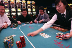 Chinese state television reports that police have arrested 13 South Korean casino managers for luring Chinese to gamble. <br/>AP photo