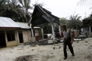 Churches attacked and one man killed in clashes in Aceh, Indonesia on Tuesday. <br/>Reuters
