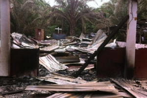 Muslim extremists burned down three churches in Indonesia's Aceh province <br/>AP photo