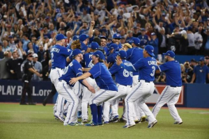 Oct 14, 2015; Toronto, Ontario, CAN; Toronto Blue Jays players celebrate on the field after defeating the Texas Rangers in game five of the ALDS at Rogers Centre. Mandatory Credit: Dan Hamilton-USA TODAY Sports <br/>