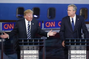 Republican U.S. presidential candidate businessman Donald Trump (L) speaks as former Florida Governor and fellow candidate Jeb Bush looks on during the second official Republican presidential candidates debate of the 2016 U.S. presidential campaign at the Ronald Reagan Presidential Library in Simi Valley, California, United States, September 16, 2015.  <br/>REUTERS/Lucy Nicholson