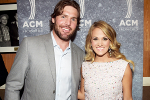Carrie Underwood pictured with her husband, Mike Fisher. The couple's child, Isaiah, was born in March 2015. <br/>Getty Images