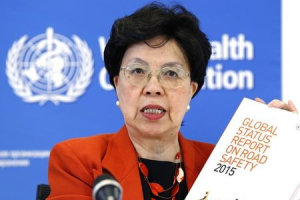 World Health Organization Director-General Margaret Chan holds the Global Status Report on Road Safety 2015 during a news conference at the WHO headquarters in Geneva, Switzerland, October 19, 2015.  <br/>REUTERS/Denis Balibouse