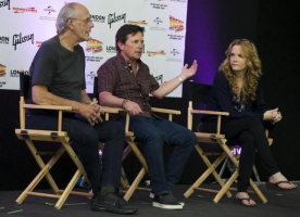 Actors Christopher Lloyd (l), Michael J Fox (c) and Lea Thompson (r) attend a media conference for the 30th anniversary of their film ''Back to the Future'' at the London Film and Comic-Con in London, Britain July 17, 2015. (Reuters/Neil Hall - RTX1KQPJ) <br/>