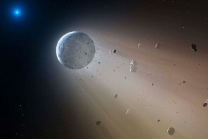 This artist's rendering provided by the Harvard-Smithsonian Center for Astrophysics shows an asteroid slowly disintegrating as it orbits a white dwarf star. (AP) <br/>