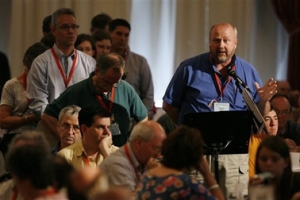 Anglican church delegates speak to a motion on the blessing of same-sex unions at the Canadian Anglican Church General Synod in Winnipeg, Canada, Saturday, June 23, 2007. The decision could ultimately lead to a split from the worldwide church. Some of the more conservative Anglican churches have already threatened the U.S. church with expulsion over its blessings of same-sex couples. <br/>(Photo: AP / Canadian Press, John Woods)
