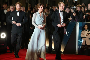 Britain's Prince Harry, from left, and the Duchess and Duke of Cambridge arrive for the World Premiere of 