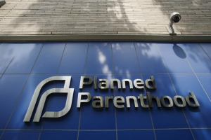 A sign is pictured at the entrance to a Planned Parenthood building in New York August 31, 2015.  <br/>REUTERS/Lucas Jackson
