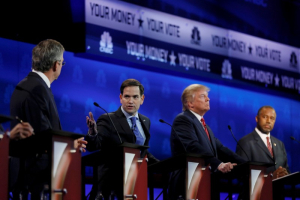 Republican U.S. presidential candidate U.S. Senator Marco Rubio speaks as former Governor Jeb Bush (L), businessman Donald Trump (2nd R) and Dr. Ben Carson (R) listen at the 2016 U.S. Republican presidential candidates debate held by CNBC in Boulder, Colorado, October 28, 2015. <br/>Reuters