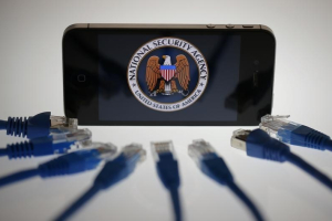 An illustration picture shows the logo of the U.S. National Security Agency on the display of an iPhone in Berlin, June 7, 2013.  <br/>REUTERS/Pawel Kopczynski