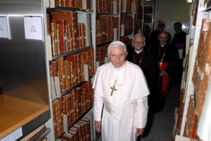 In this photo provided by the Vatican newspaper L'Osservatore Romano, Pope Benedict XVI, followed by Archbisop Raffaele Farina and Cardinal Jean-Louis Tauran visits the Vatican library, Monday, June 25, 2007. The pope paid the Vatican archives and library, which holds some 1.6 million books, a visit before it shuts down for a three-year restoration. <br/>(AP Photo/L'Osservatore Romano, HO)