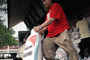 World Vision unloading relief materials in the Philippines <br/>