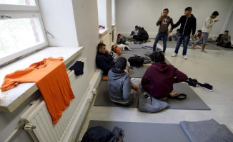 Asylum seekers rest in a refugee center in Lahti, Finland September 25, 2015.  <br/>Reuters