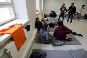 Asylum seekers rest in a refugee center in Lahti, Finland September 25, 2015.  <br/>Reuters