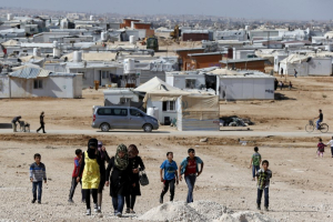 Syrian refugees walk at Al Zaatari refugee camp in the Jordanian city of Mafraq, near the border with Syria, November 1, 2015.  <br/>REUTERS/ Muhammad Hamed