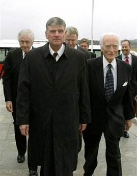 Rev. Franklin Graham, front, arrives at Pyongyang airport, North Korea, Tuesday, Oct. 13, 2009. Graham, who leads a Christian relief group, visited North Korea to deliver aid to the impoverished communist nation. <br/>(Photo: AP Images / Kyodo News) 