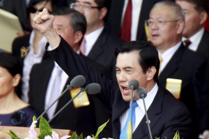 Taiwan's President Ma Ying-jeou raises his fist after giving a speech during National Day celebrations in front of the presidential office in Taipei, Taiwan, October 10, 2015.  <br/>Reuters