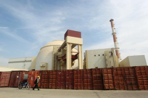 A Russian worker walks past the Bushehr nuclear power plant, 1,200 km (746 miles) south of Tehran October 26, 2010.  <br/>Reuters