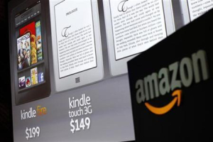 Graphics of the new Amazon Kindle tablets are seen at a news conference during the launch of Amazon's new tablets in New York, September 28, 2011. (Reuters/Shannon Stapleton) <br/>