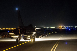 A French fighter jet taxis along the runway in an undisclosed location, in this handout picture released by the ECPAD late November 15, 2015.  <br/>Reuters
