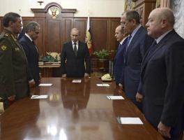 Russian President Vladimir Putin (3rd L) with armed forces Chief of Staff Valery Gerasimov (L), Defence Minister Sergei Shoigu (2nd L), Federal Security Service (FSB) Director Alexander Bortnikov (3rd R), Foreign Minister Sergei Lavrov (2nd R) and Director of Russia's Foreign Intelligence Service (SVR) Mikhail Fradkov (R) stand in a moment of silence before a meeting on Russian plane crash in Egypt at the Kremlin in Moscow, Russia November 17, 2015. <br/>Reuters