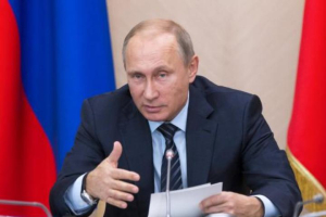 Russia's President Vladimir Putin has declared that the ISIS attack on a Russian plane on Halloween will be met with, 