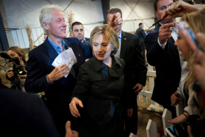 Democratic U.S. presidential candidate Hillary Clinton (R) and former U.S. President Bill Clinton greet supporters at the Central Iowa Democrats Fall Barbecue in Ames, Iowa November 15, 2015.  <br/>Reuters