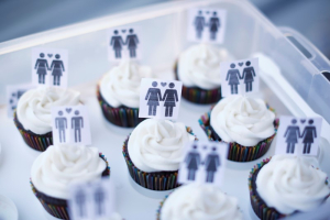 A box of cupcakes are seen topped with icons of same-sex couples at City Hall in San Francisco, June 29, 2013. <br/>Reuters