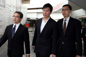 Kong Hee leaving the State Courts with his Lawyers. <br/>Straits Times/ WONG KWAI CHOW