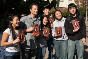 Kirk Cameron of Living Waters ministry poses with UCLA students. Living Waters distributed tens of thousands of copies of a special edition of 'On the Origin of Species' that included a pro-Intelligent Design introduction by Ray Comfort on Nov. 18, 2009. <br/>(Photo: Living Waters)