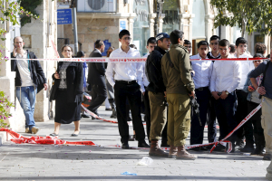 Israeli soldiers secure the area after a stabbing attack by two Palestinian women took place in central Jerusalem, November 23, 2015. <br/>Reuters