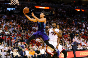 Oct 28, 2015; Miami, FL, USA; Charlotte Hornets guard Jeremy Lin (7) drives to the basket as Miami Heat forward Justise Winslow (20) looks on during the first half at American Airlines Arena. Reuters/Steve Mitchell-USA TODAY Sports <br/>