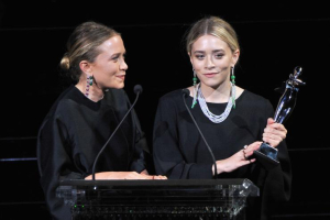 Designers Mary-Kate Olsen (left) and Ashley Olsen spoke onstage at the 2014 CFDA fashion awards at Alice Tully Hall, Lincoln Center on June 2, 2014 in New York City. The twins turn 29 on Saturday, June 12, 2015.  <br/>D Dipasupil/Getty Images