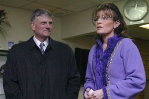 Former governor of Alaska and vice presidential candidate Sarah Palin arrives at the Asheville, N.C. airport on Sunday afternoon Nov. 22, 2009, for a visit with the Graham family. At left is Franklin Graham, who was there to meet her at the airport. <br/>AP/The Citizen-Times, Stephen Miller
