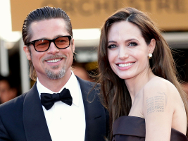 Hollywood actor Brad Pitt pictured with his wife, Angelina Jolie <br/>Getty Images