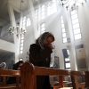 Woman Praying in a Church in MIddle East