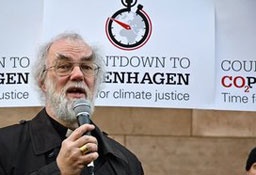 Rowan Williams, Archbishop of Canterbury, starts a demonstration in front of Copenhagen Cathedral with a speech on why people must engage in the climate issue. <br/>DanChurchAid / Peter Hovering