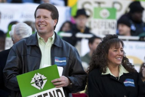 Jim Bob Duggar (L) and his wife Michelle Duggar (R) in Columbia, South Carolina, on the steps of the State House January 14, 2012.REUTERS/CHRIS KEANE <br/>Reuters
